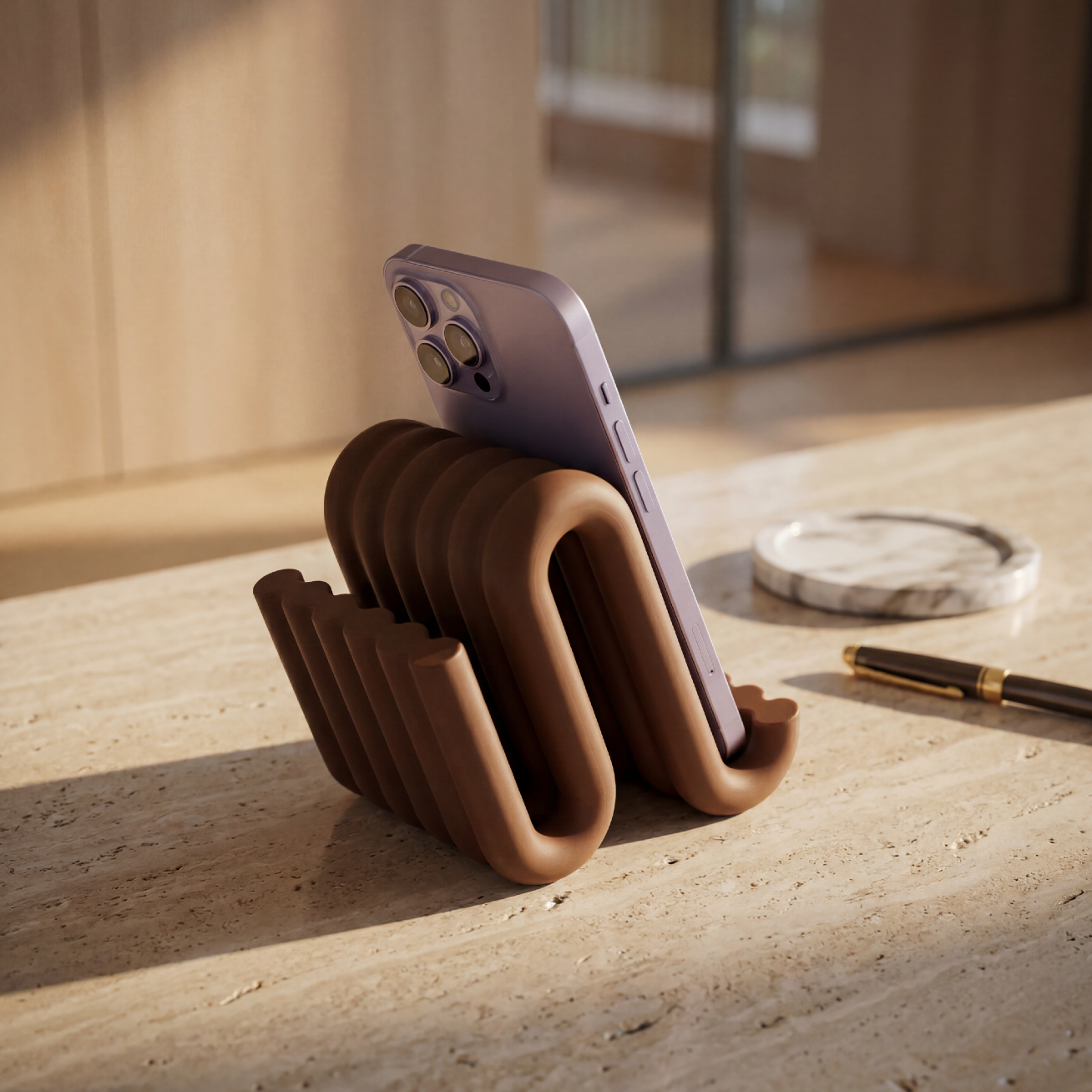Phone holder with a phone on a marble surface